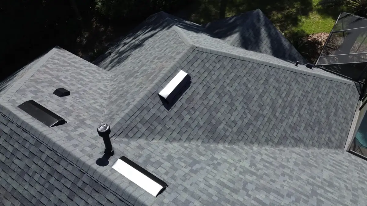 Finished Estate Gray Owens Corning Duration roof with black accessories in Gainesville, FL