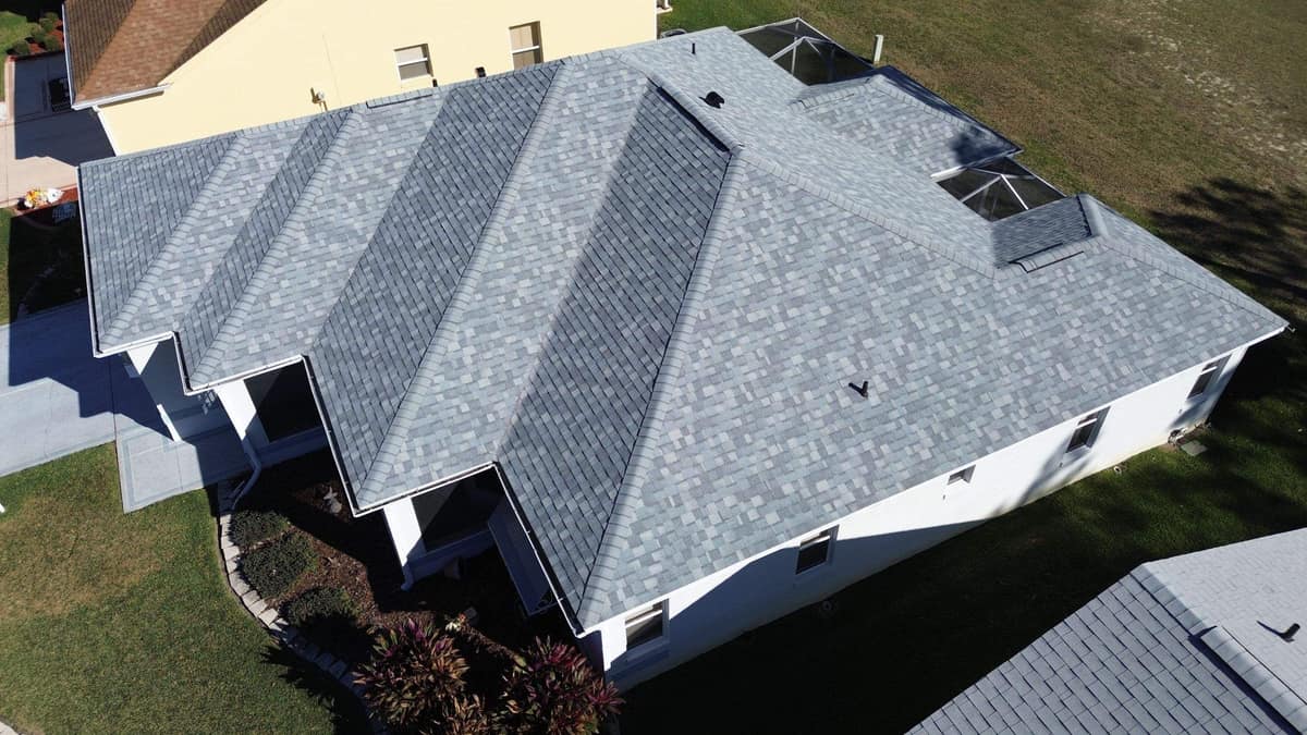 Drone view of the new gray shingle roof and stepped hips on a Lady Lake home