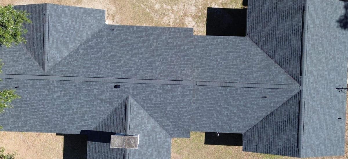 Looking straight down on the Newberry roof, with its ridge vents, valleys and block chimney