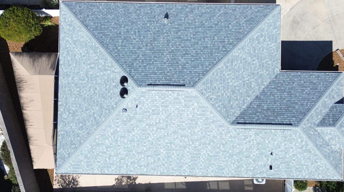 Overhead drone view of the hip lines, ridge vents and round black vents in The Villages