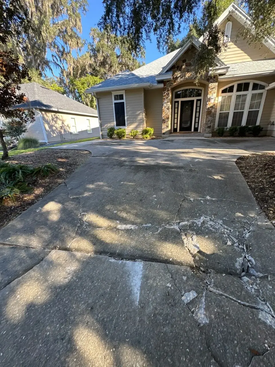 Front view of a house with a roof in Arbor Greens, Newberry, Florida