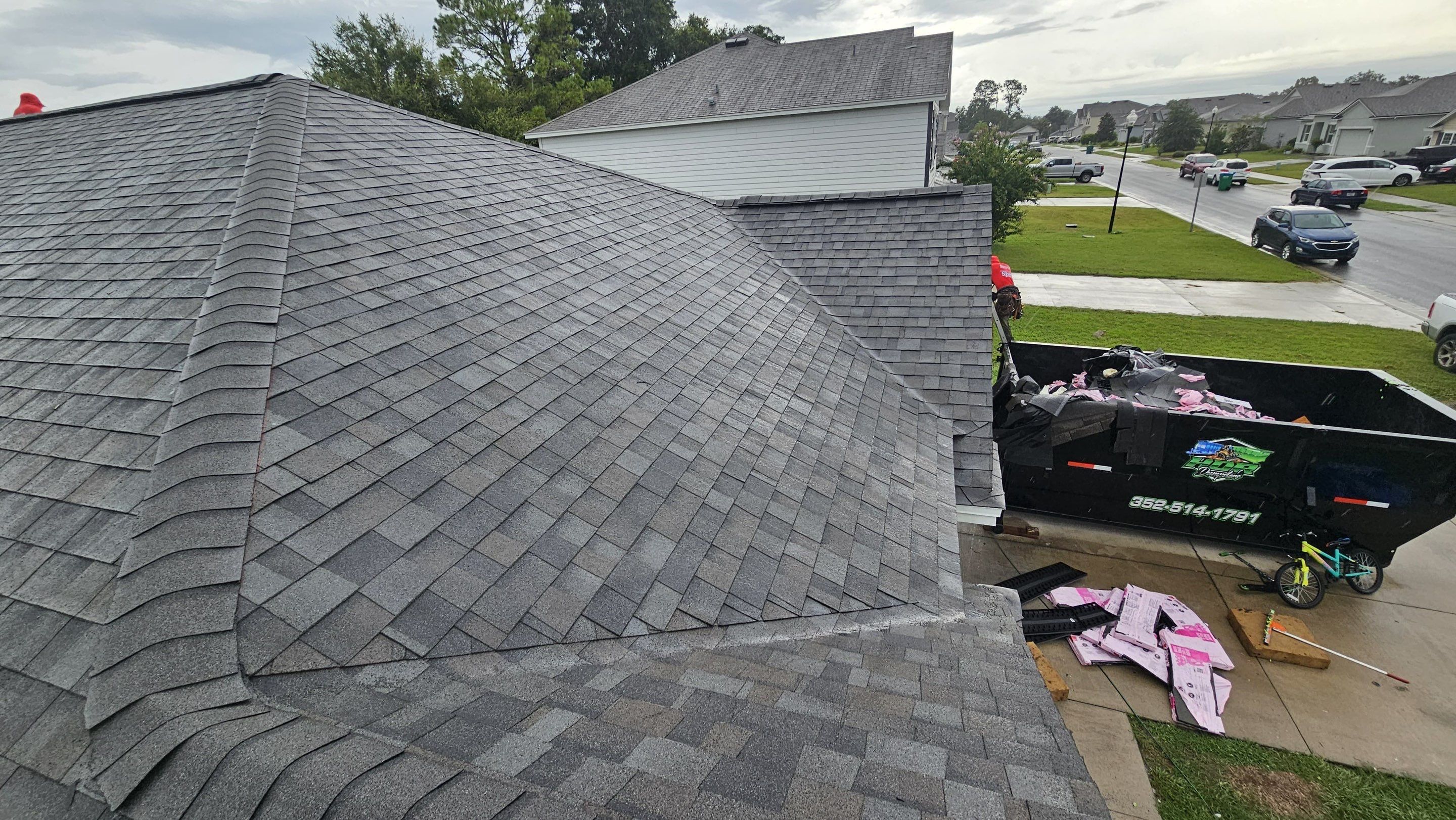 West Newberry Williamsburg Gray roof white drip edge