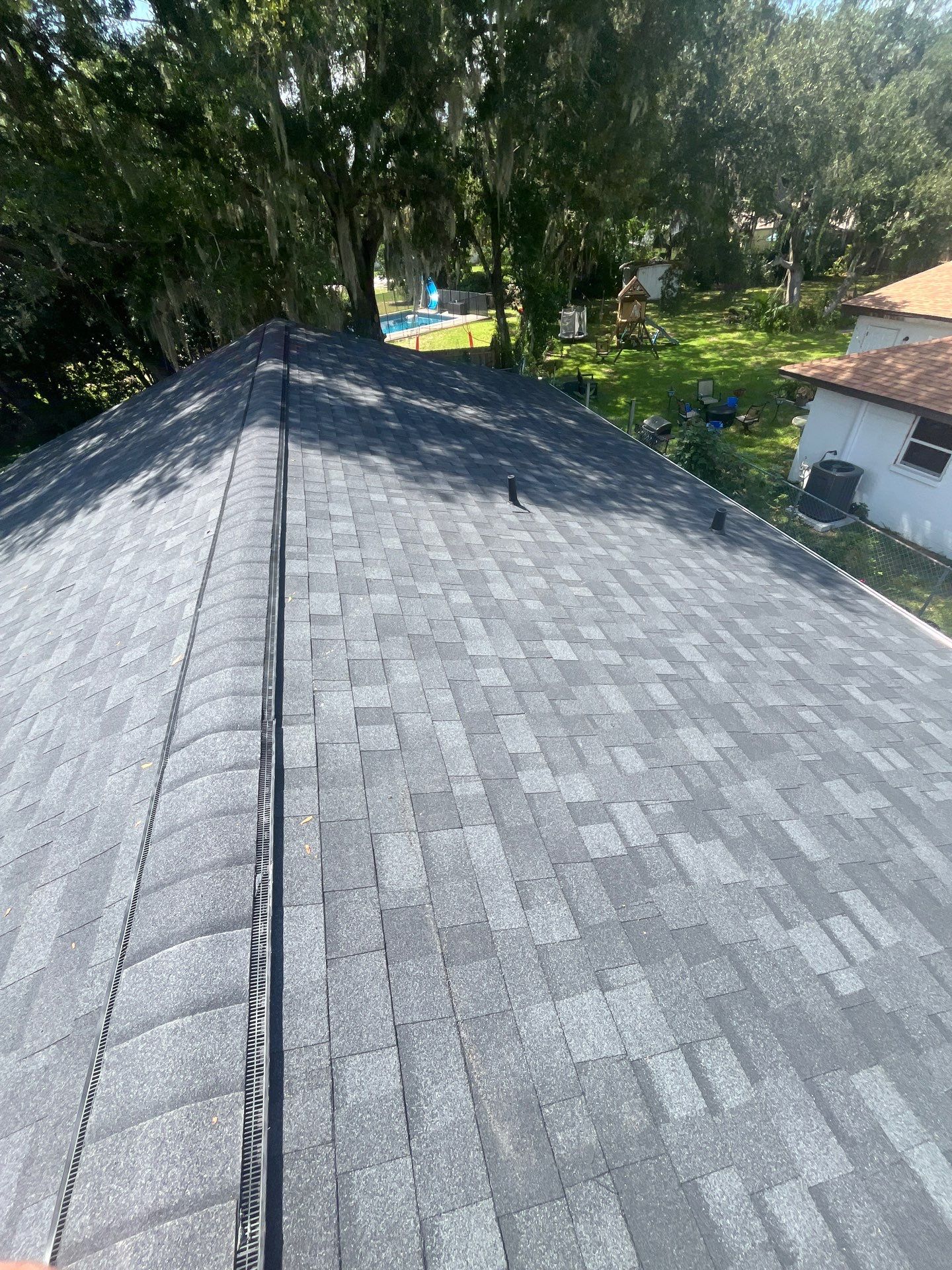 Ocala Silver Springs Shores Onyx Black roof white drip edge