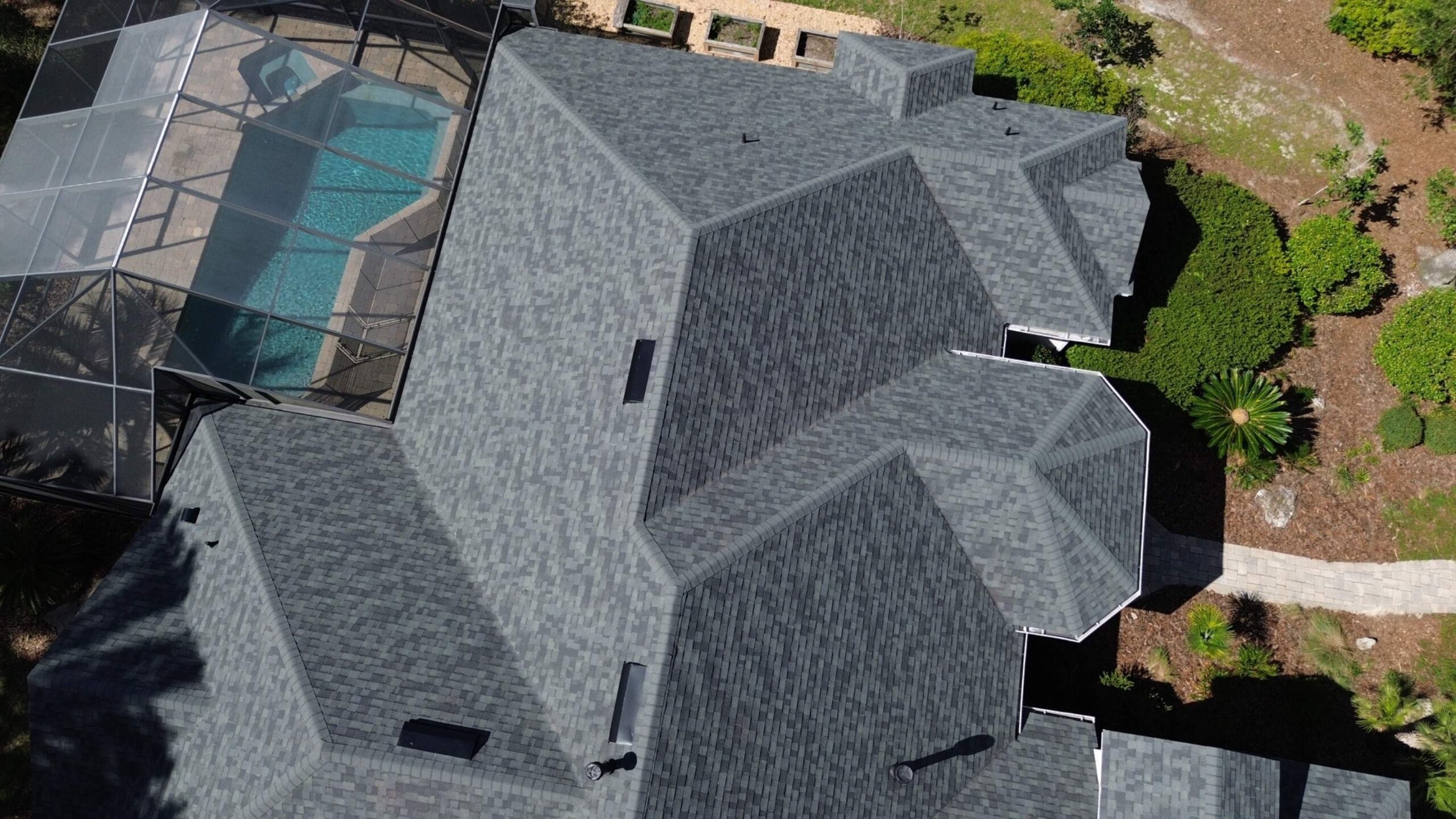 Owens Corning Duration Estate Gray shingles being installed in Gainesville, FL